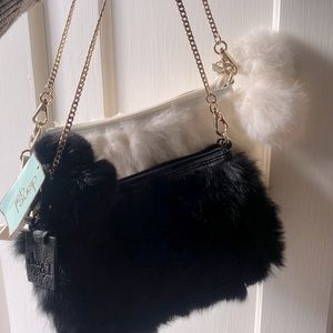 Black AND White versions of the same fur clutch bags.